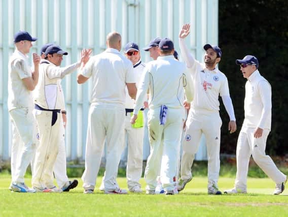 Uddingston players celebrate after Paul Hoffmann had dismissed Gavin Meikle for LBW when he was on 13 runs (Pic by Alan Watson)