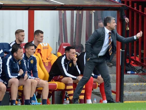 Motherwell manager Stephen Robinson roars his team on against Rangers (Pic by Alan Watson)