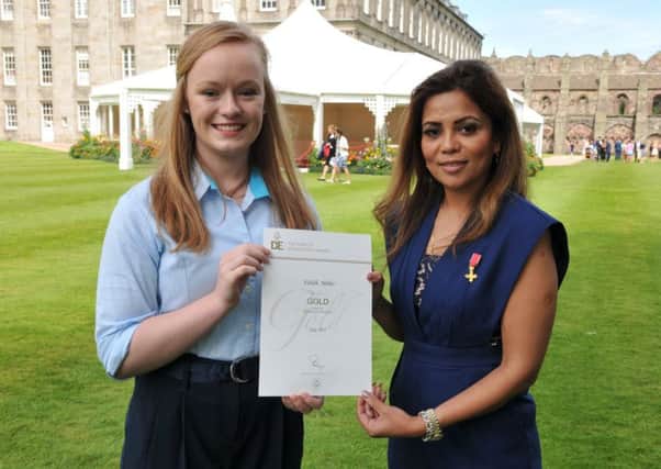 Eilidh Miller, gold award winner, with  Scottish-Indian entrepreneur and philanthropist Poonam Gupta who presented her award.