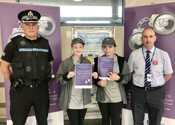 Inspector Alistair Anderson, Police Scotland youth volunteers Alanna Ferguson and Alanah Prentice, and Scotmids Ian Lovie