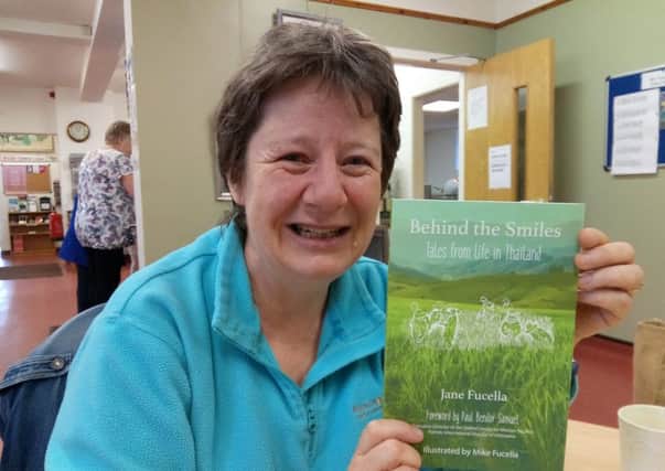 From Bangkok to the Gillespie Centre in Biggar...Jane Fucella with her book, Behind the Smiles.