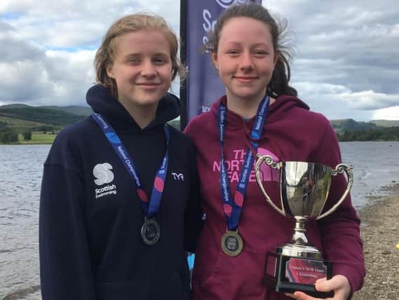 Abbigail (right) with her cup and medal from Loch Venachar and Heather with her medal from the same competition (Pic by Stuart Stevenson)