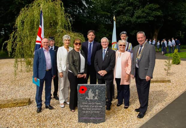 The unveiling of a new commerative stone to the fallen in all conflicts at the Peace Garden in Ivanhoe Road in Cumbernauld 20/8/17 l to r: John Duffy, Tony Farrell (Queens Colour Guard) Ruth Duffy, Maureen Jukes, Paul Jukes, Bob Johnstone, Jean Johnstone, Keiran Williams Cadet Flight Sgt, Tom Porter (Rotary President)