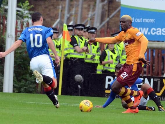 Cedric Kipre in action for Motherwell against Rangers earlier this season (Pic by Alan Watson)