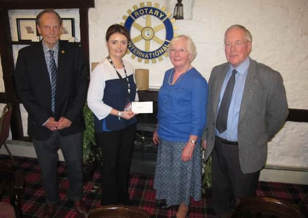 Biggar Rotarians present the cheque to CHAS.