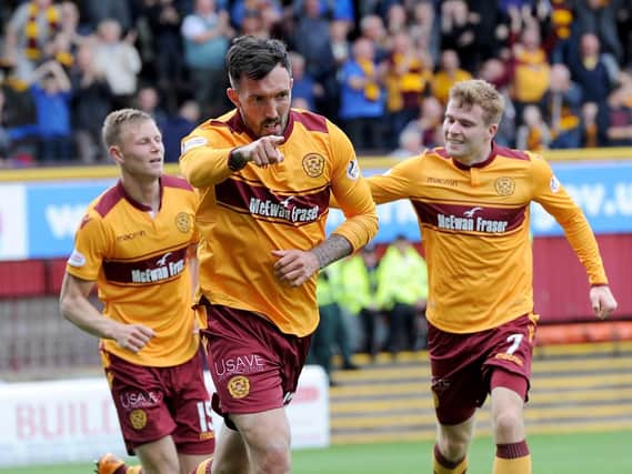 Ryan Bowman celebrates scoring his first goal at Fir Park for Motherwell with team-mates Andy Rose and Chris Cadden (Pic by Alan Watson)