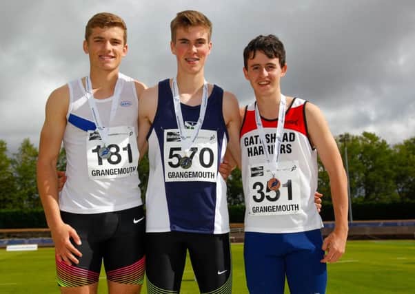 National champion Michael Dunn with runner-up Stuart Kirk (left) and bronze medalist Oliver Lewis