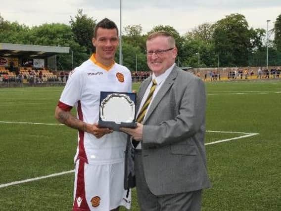 Marvin Johnson pictured after picking up a man-of-the-match award in a friendly at Annan Athletic in July 2016