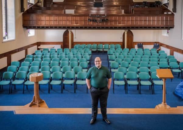 The Rev Bryan Kerr in the new-look church