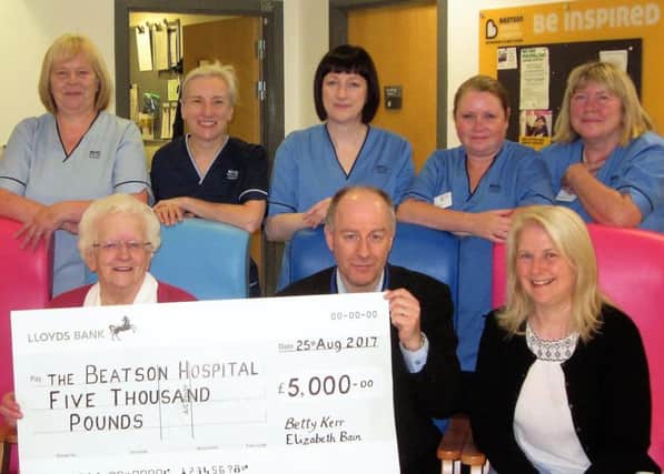 Betty Kerr from Carluke, who will be 82 in November, presents her latest cheque to the Beatson. The Â£5000 brings her total to over Â£35,000

submitted photo September 2017