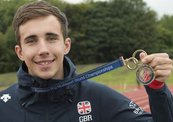 Cameron Richardson with his world duathlon gold medal