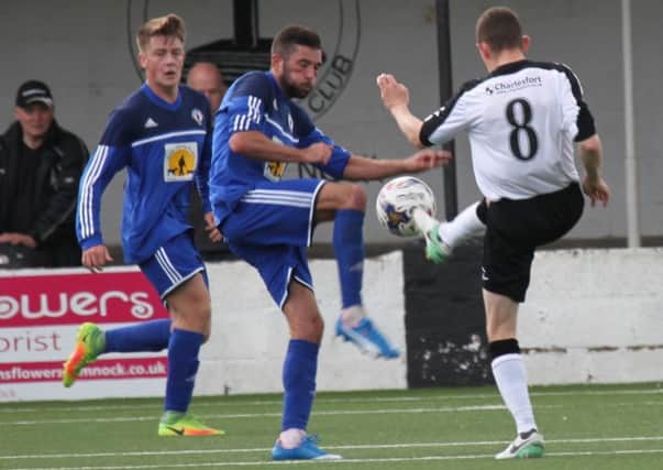 Gavin Mackie battles for possession with a Cumnock player (pic by Alison Scott)