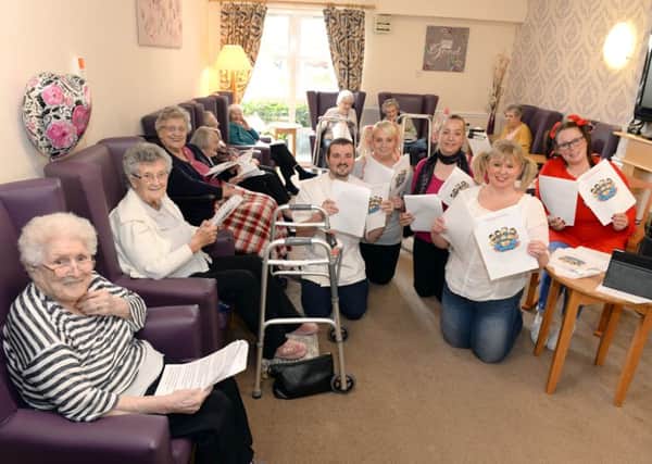 Residents at Highgate Care Home in Viewpark enjoy their weekly sing-a-long on a Friday afternoon led by the activity coordinators to help reconnect with previous memories. Pic: Alan Watson