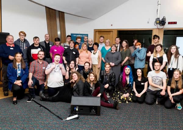 Reeltime from Newarthill celebrated its 20th anniversary on a visit to the Scottish Parliament