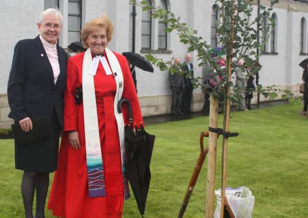 Rev Christine Goldie and Very Rev Lorna Hood dedicate the tree