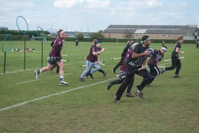Quidditch players take to the field