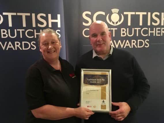 John Fleming of Cross Butchers Kilsyth receives traditional steak pie gold award