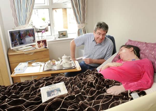 Dee McGreevy and her husband Thomas, pictured at Dee's care home in Uddingston. Pic: Colin Hattersley