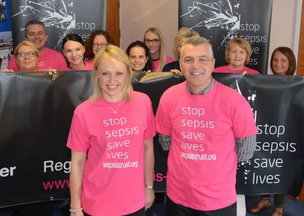 NHS Lanarkshire's Martin Carberry (front, right) with clinical colleagues raising awareness of World Sepsis Day