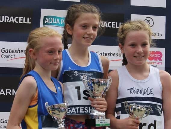 Valencia on the podium after her Great North Run triumph
