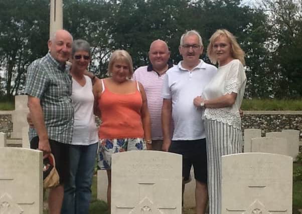 Descendants of Joseph MacPherson at his grave 100 years after his death.