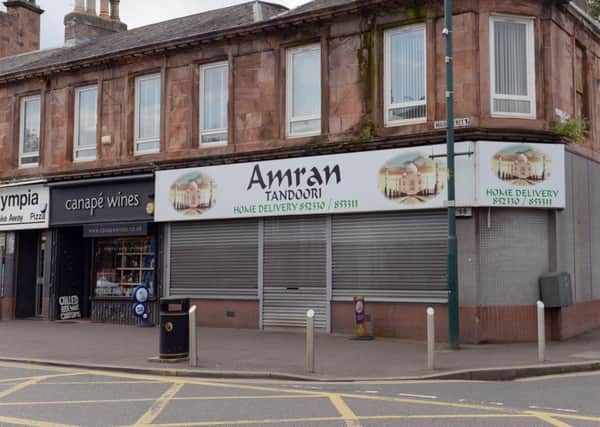Amran Tandoori sign must come down, say planners