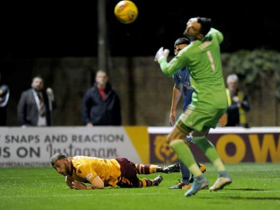 Louis Moult opens the scoring for Motherwell against Aberdeen (Pic by Michael Gillen)