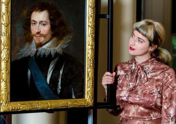 Glasgow Museums curator Pippa Stephenson admires the previously "lost" Rubens masterpiece in Pollok House.