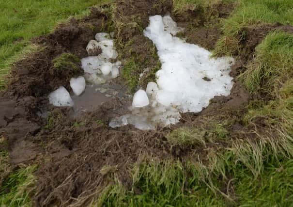 Part of the block of ice that landed in a garden in Busby, Renfrewshire. Pic: SWNS