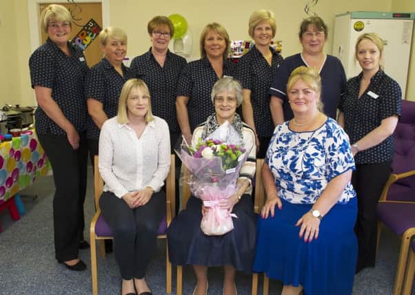 Dr Christine Young (front, centre) will colleagues from The Wilow Practice as they celebrate her retirement. Pic: Craig Halkett