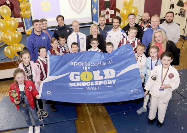 The school held a special assembly to unveil the sportscotland Gold Flag. Picture: Michael Gillen.