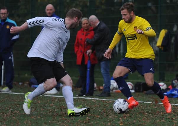 Harestanes' Jamie Broadfoot takes on a Dunblane defender (pic by Jamie Forbes)