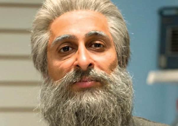 Sanjeev in one of his best known roles - shopkeeper Navid in Still Game.
