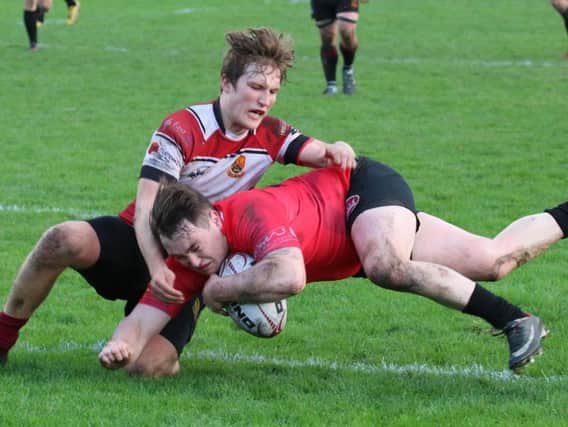 Biggars Carne Green scores one of his three tries in the 62-6 win at Preston Lodge last Saturday (Pic by Nigel Pacey)