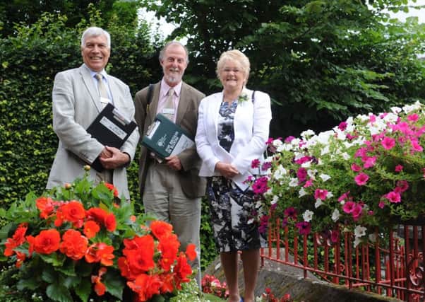 BritaIn in Bloom judges in Uddingston back in 2013, when the town established its winning form