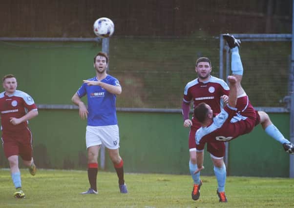 A specatcular effort at goal from Cumbernauld's Davie Dickson against Irvine Meadow. (pic by Craig Halkett).