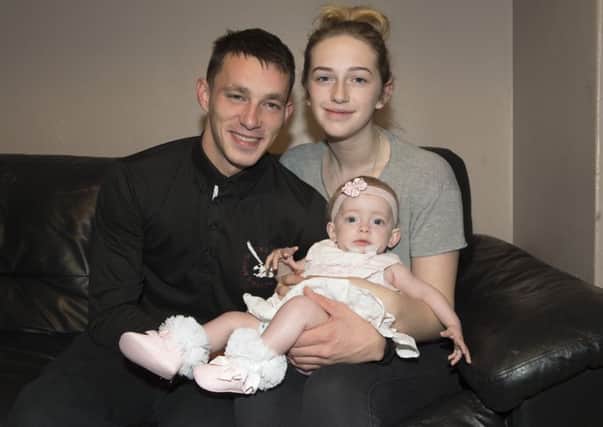 Bonnie with her parents Jack McMillan and Kayla Strachan