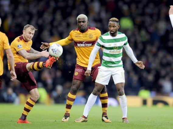 Motherwell defender Cedric Kipre (centre) was controversially sent off for a challenge on Celtic striker Moussa Dembele (right) (Pic by Michael Gillen)