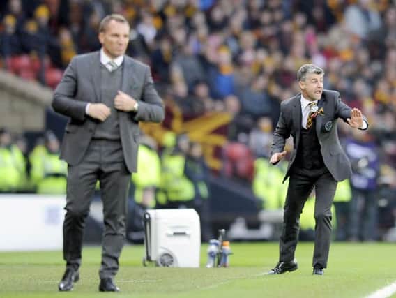 Motherwell manager Stephen Robinson (right) told the press after Sunday's cup final defeat that he isn't a manager to criticise other team's players. Also pictured is Celtic manager Brendan Rodgers. (Pic by Michael Gillen)