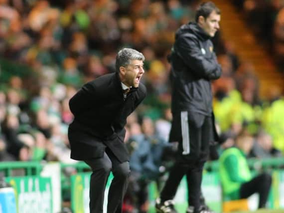 Motherwell manager Stephen Robinson looks a frustrated figure as he surveys the wreckage of Saturdays heavy 5-1 defeat at Celtic Park (Pic by Ian McFadyen)