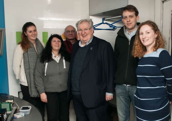 Jimmy Hood pictured in 2015 with staff and volunteers of Lab on a Lorry