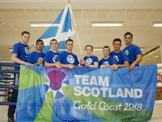 Cleland boxer Stephen Newns (second right) is pictured with fellow Scotland 2018 Commonwealth Games team members Aqeel Ahmed, Nahaniel Collins, John Docherty, Reece McFadden, Robbie McKechnie and Victoria Glover. Also pictured is the SNP governments sports minister Aileen Campbell.