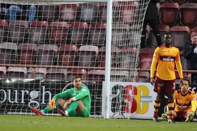 Motherwell stars Griffiths, Bigirimana and Dunne look crestfallen in the wake of Lafferty's winner for Hearts (Pic by Ian McFadyen)