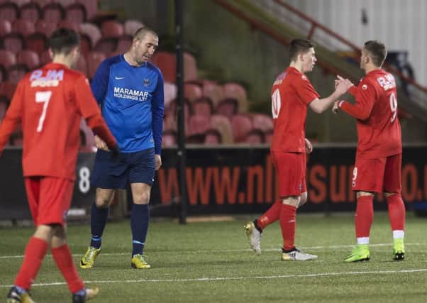 Celebrations after Colts' fifth goal, scored by Fraser Sheridan (pic by Craig Halkett)