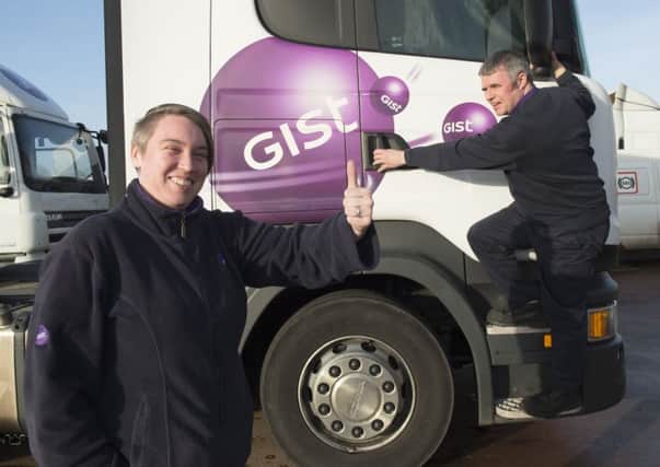 Natalie Anderson and Charlie ONeill from Gist with one of the vehicles you could learn to drive. Pic: Craig Halkett