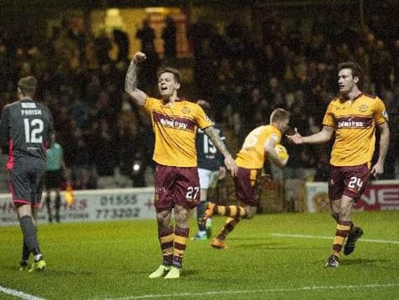 Motherwell's Craig Tanner celebrates scoring penalty against Dundee (Pic by Angie Isaac)