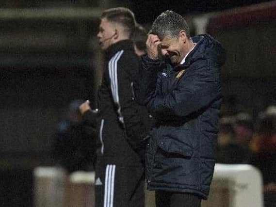 A frustrated looking Stephen Robinson on the touchline during Saturday's 1-1 draw against Dundee (Pic by Angie Isac)