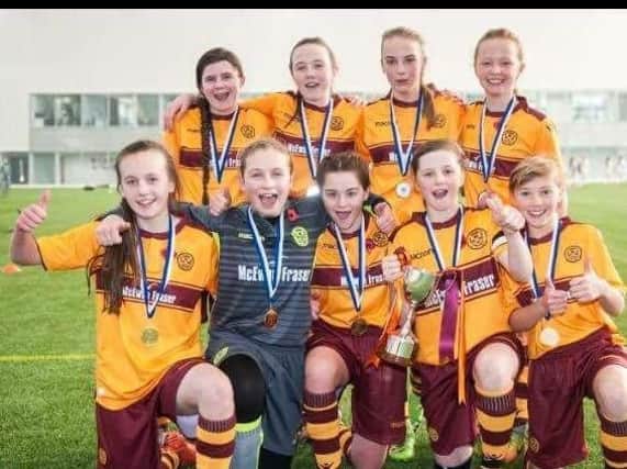 Motherwell under-13 Clarets squad members celebrate their memorable Scottish Cup victory (Submitted pic)