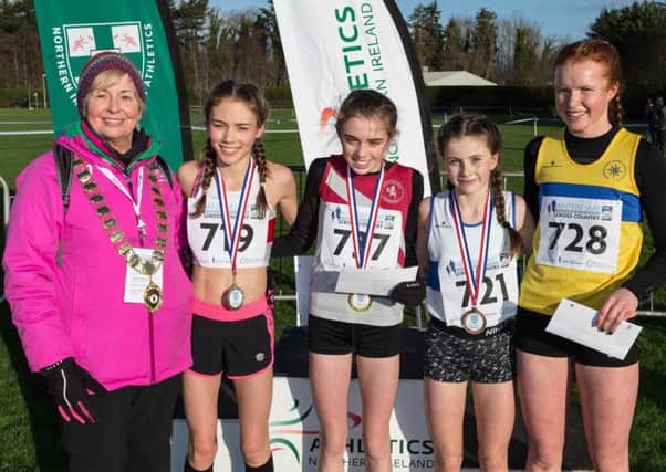 Garscube's Anya MacLean (second right) of Garscube Harriers finished third in Antrim (pic by Bob Given Photography)