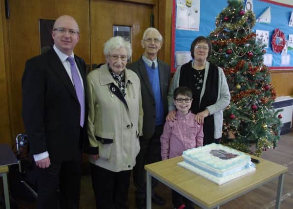 Bellshill West minister The Rev Calum Stark, two of the eldest members Alex and Rena Davidson, and one of the youngest Logan Dickson with the Moderator of Hamilton Presbytery Roberta Hutton